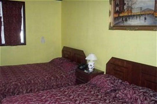 Regency Suites Hotel Джорджтаун Номер фото